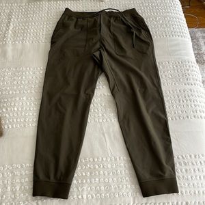 Lululemon army green waterproof joggers with zipper back pocket